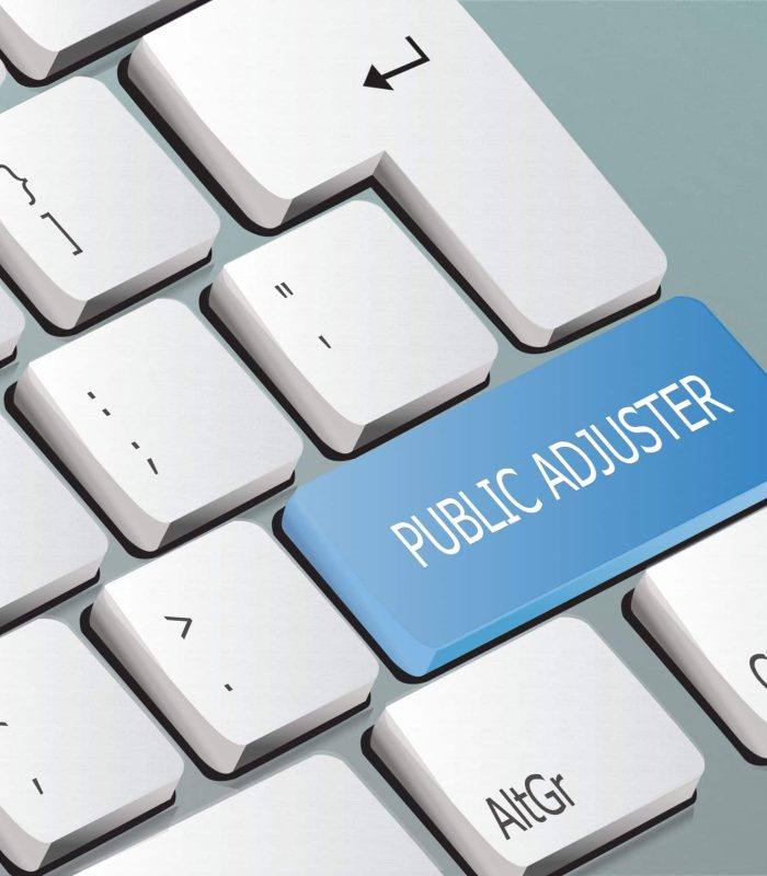 public adjuster written on the keyboard button